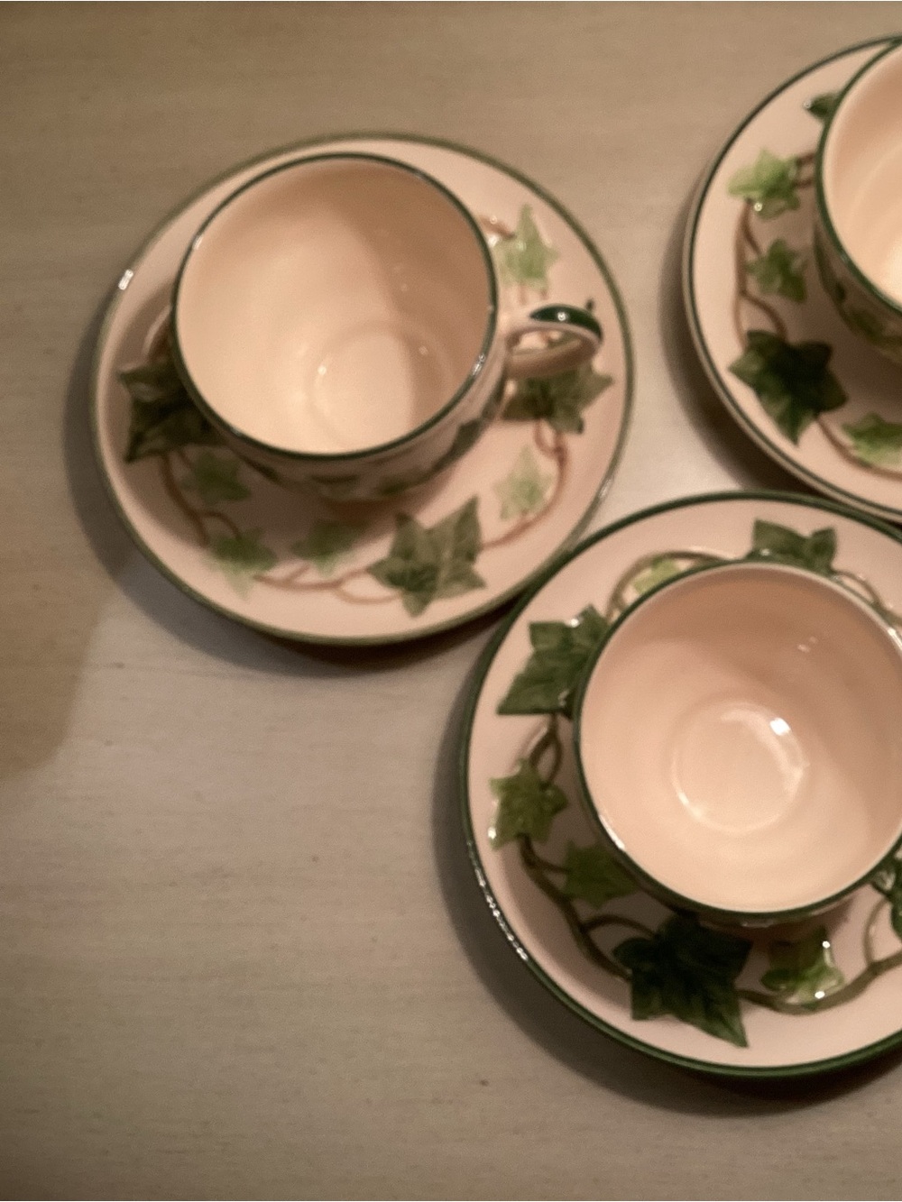 Ivy-Trim Cream Teacup and Saucer Set - Green Leaf Accent